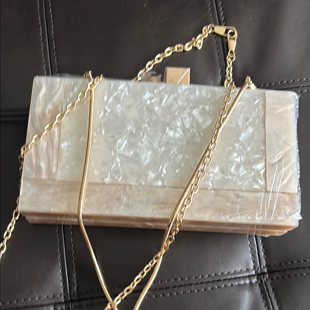 Elegant Cream Clutch with Gold Chain